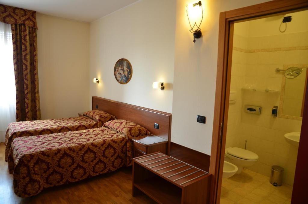 Hotel Hdomus Nogarole Rocca Værelse billede